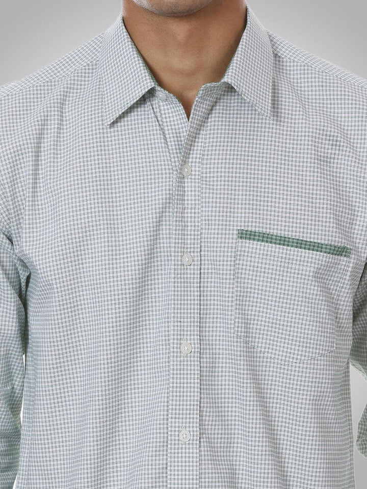 a man wearing a white shirt and tie 
