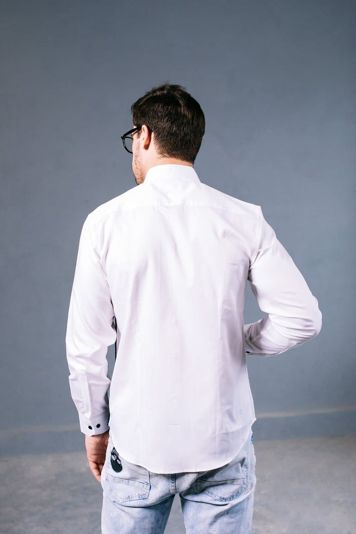 a man in a white shirt and a white shirt 